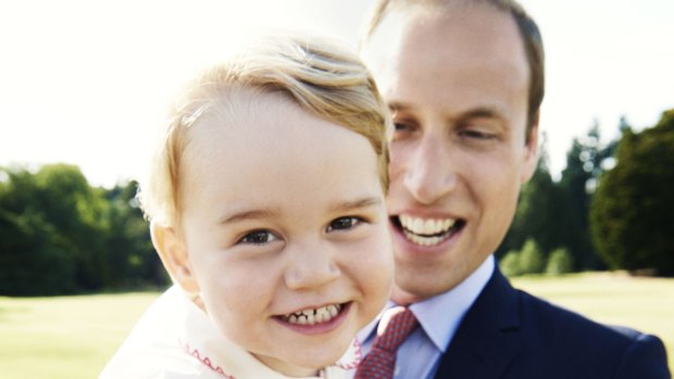 Prince George plays with his father, Prince William, in a 2015 photograph released to mark his second birthday.