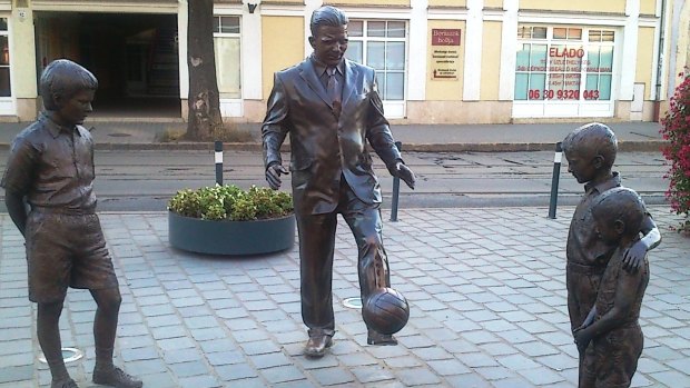 Ferenc Puskas, soccer wizard, magically juggles the ball.