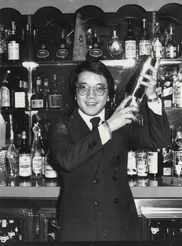 Mathew Chan mixing cocktails in 1977.