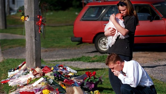 Ian Thompson and Amanda MacIntyre with their 8-week-old baby pay tribute to the police officers on August 18, 1998. Ian was arrested by Gary Silk for car theft. Ian said "Most coppers treat you like shit, but he treated you like a human being."