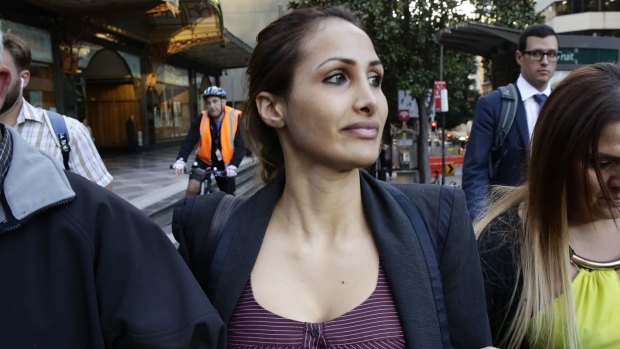 Settled: Rachelle Louise, girlfriend of jailed murderer Simon Gittany, leaves court during defamation proceedings against Nationwide News.