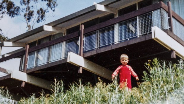 Photograph of Alan as a child, in the backyard of their home.