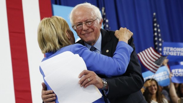 Hackers struck a blow to the Democratic National Committee when information embarrassing to Hillary Clinton, pictured with Bernie Sanders, was released by WikiLeaks.