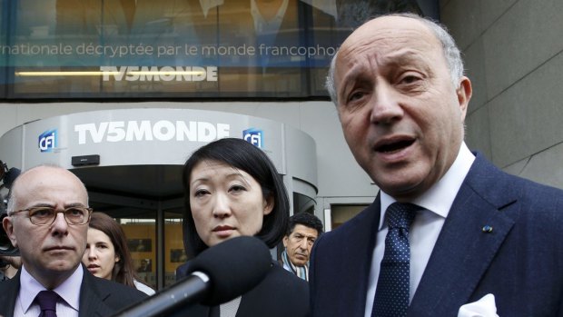 French Foreign Affairs Minister Laurent Fabius (right).