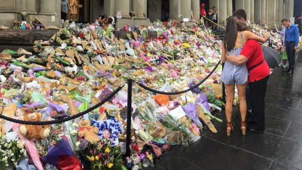 Tributes to victims at the shrine in Bourke Street. 
