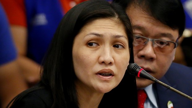 Bank manager Maia S. Deguito testifies before the Philippine Senate Blue Ribbon Committee probe into how $81 million of Bangladesh's stolen funds were transmitted online to four private accounts.