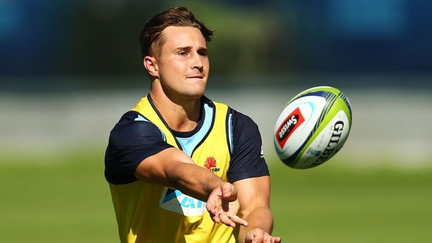Backed by teammates: David Horwitz passes the ball during a Waratahs training session.