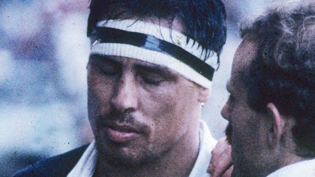 Brutal: All Blacks star Wayne Shelford leaves the field injured at the infamous 1986 'Battle of Nantes' test against France.