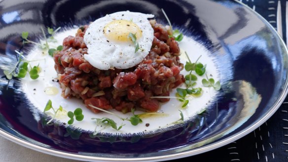 Beef tartare with quail egg.