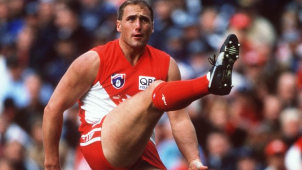 On staff: Tony Lockett in action for the Swans against Geelong in 1998.