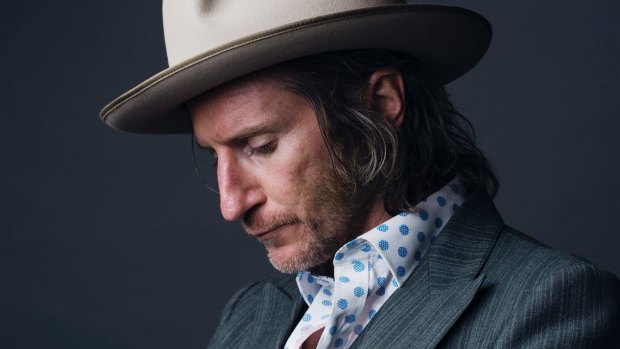 Australian rock musician, writer and front man of the band YOU AM I, Tim Rogers.