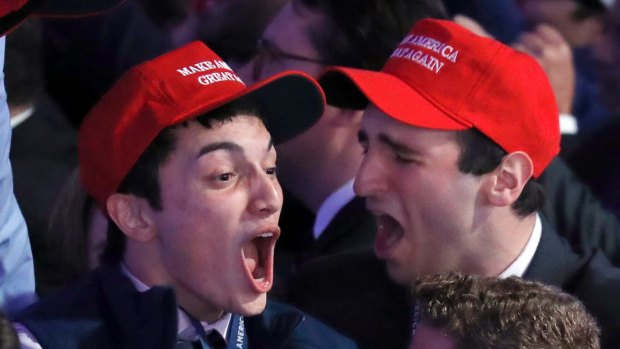 Supporters of Republican presidential candidate Donald Trump react as they watch election results.
