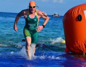 Garry Maddox heads out of the swim leg at the world age group triathlon championships in Mexico in 2016. 