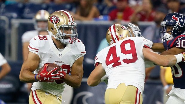 Cisco kid: Jarryd Hayne (left) rushes during a pre-season game with the San Francisco 49ers.