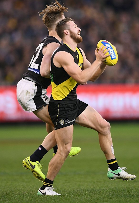 Steady hands: Kane Lambert marks in front of Nick Graham.