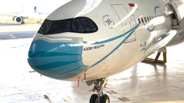 The mask design has been added to one of Garuda's Airbus A330-900neos in support of the Indonesian government's "Let's Wear Masks" campaign.