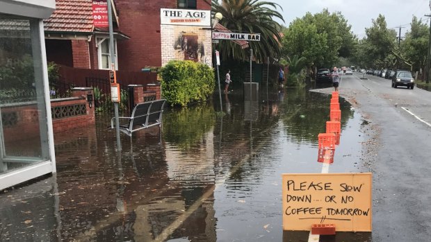 A warning sign for motorists at the front of Jerry's Milk Bar.