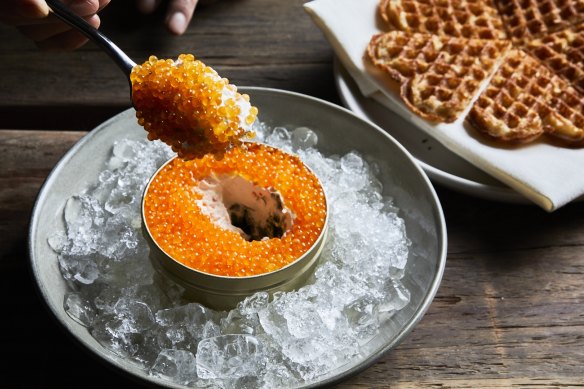 The signature snack might be waffles with trout roe and smoked sour cream.