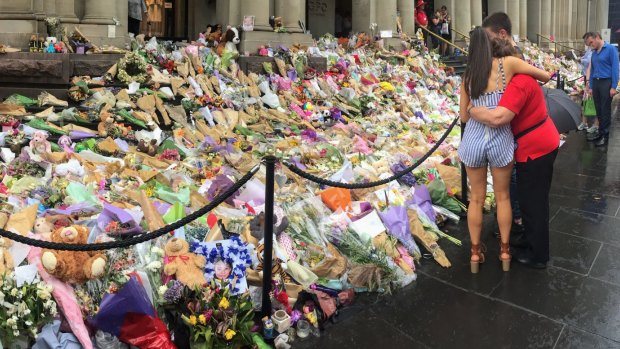 Tributes to victims at the shrine in Bourke Street. 
