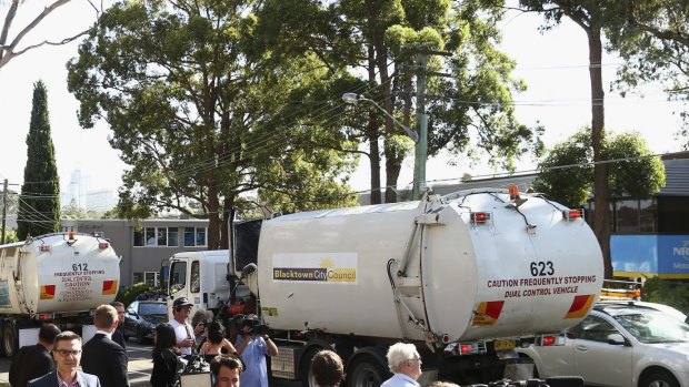 Blacktown City Council garbage trucks protest outside SBS headquarters in 2015. 