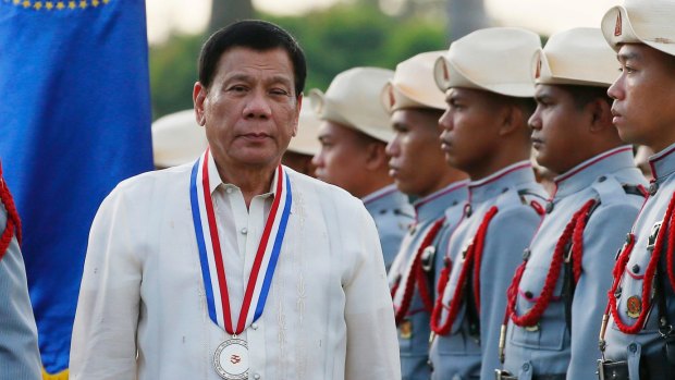 Philippine President Rodrigo Duterte, centre, said his war on drugs will continue for his entire term.