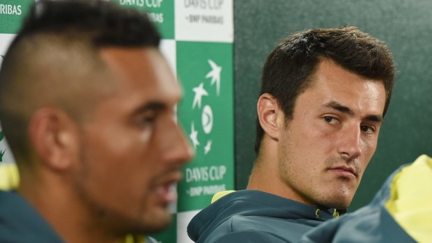 Different people: Nick Kyrgios (left) and Bernard Tomic.