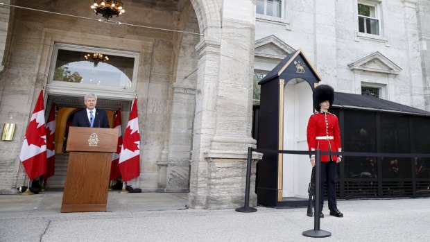 Canadian Prime Minister Stephen Harper door stops at Rideau Hall after asking Governor General David Johnston to dissolve Parliament on Sunday.