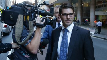 Liberal party fundraiser Aaron Henry leaving the ICAC hearing.