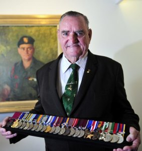 Keith Payne, VC with his medals which he donated to the Australian War Memorial.
