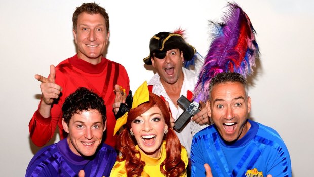 Wiggles Lachlan Gillespie (bottom left) and Emma Watkins (centre) have announced their engagement.