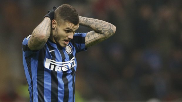 Inter Milan's Mauro Icardi grimaces after missing a penalty.