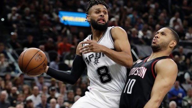Flying start: Patty Mills gave Spurs the early advantage over the Rockets.
