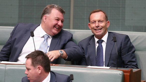 Mr Kelly in discussion with former prime minister Tony Abbott  during question time in November.