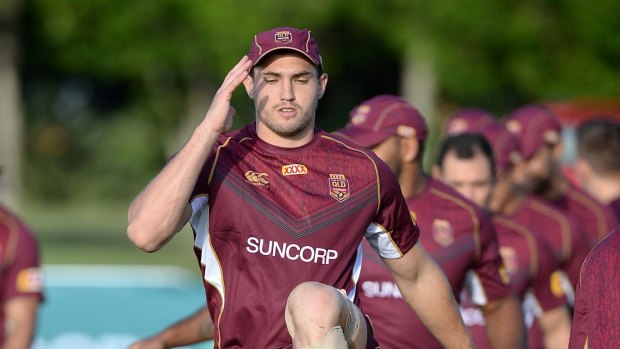 Maroons winger Corey Oates performs a drill during a recent State of Origin training session at the Gold Coast.