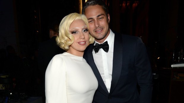 Engaged: Taylor Kinney popped the question to Lady Gaga on Valentine's Day.