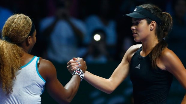 Serena Williams and Ana Ivanovic shake hands after the match.