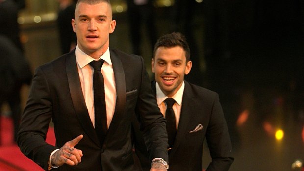 Dustin Martin and his date for the night Sam Lloyd.