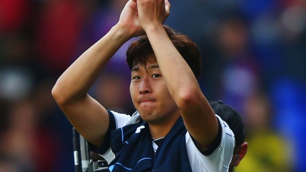 Key man: Son Heung-Min of Tottenham Hotspur applauds the fans after victory.