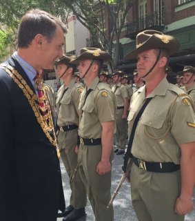 Lord Mayor Graham Quirk speaks with a soldier from 6th Battalion RAR.
