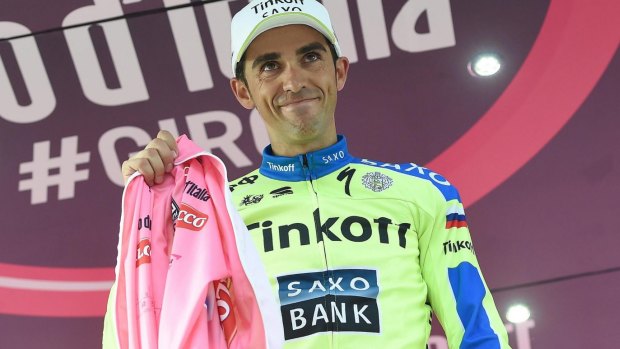 Contador cannot put on the pink jersey because of his injuries.