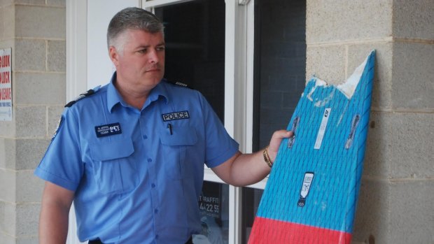 Authorities are inspecting the mauled surfboard to determine the species of shark involved in the fatal attack in Esperance.