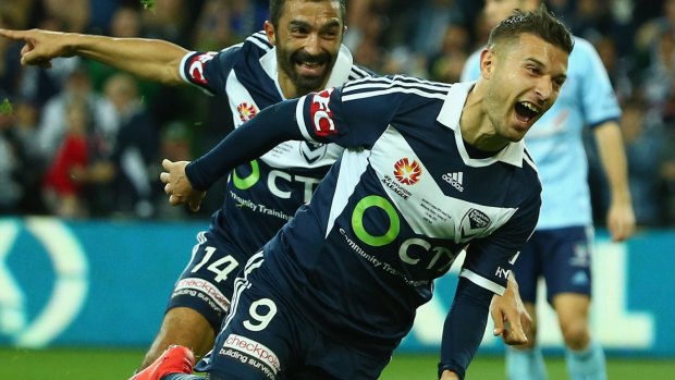 Get in: Kosta Barbarouses of the Victory celebrates after scoring in the grand final. 