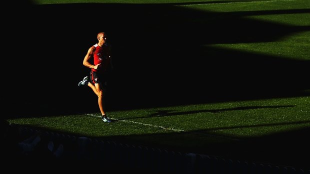 Sam Reid of the Swans runs laps during at the SCG.