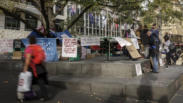A group of homeless people have set up their tents and belongings at City Square.