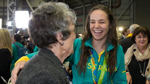 Rugby sevens gold medal winner Chloe Daltan is welcomed home by her grandmother Christine Goodburn.