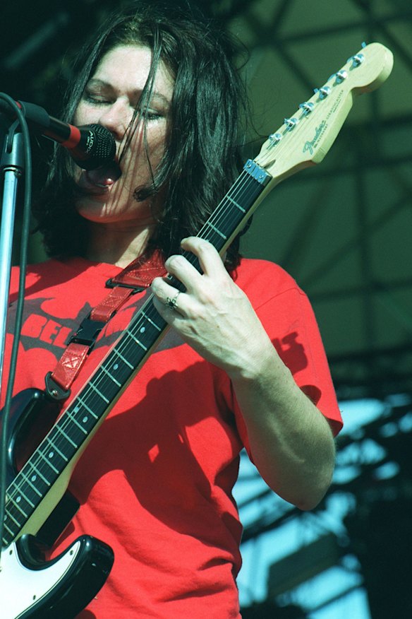 Kim Deal on stage with the Breeders and "pushing things forward".