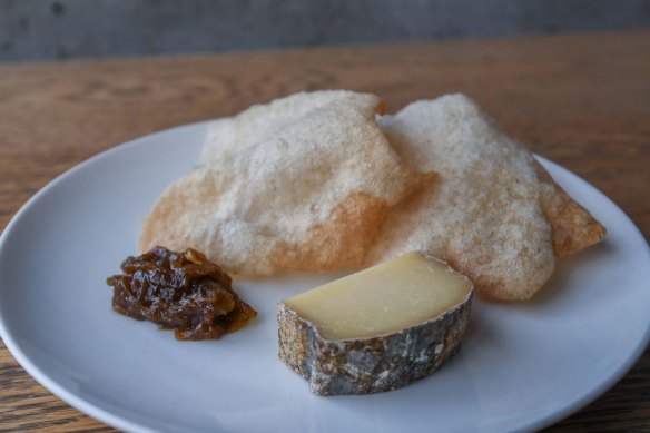 Lucy Whitlow's tomme cheese with onion jam, sourdough crisps.