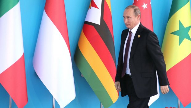 Russian President Vladimir Putin arrives at the G20 Summit in Antalya.