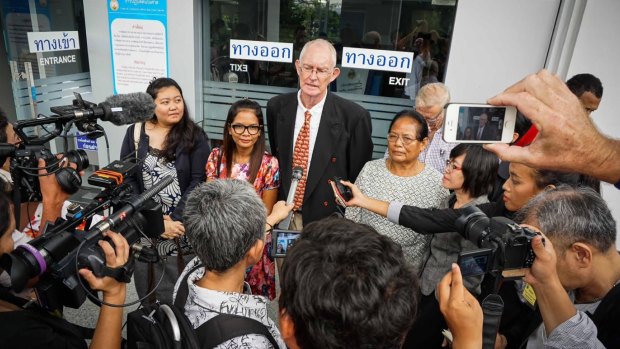 Alan Morison and Chutima Sidasathian, second from left, at the courthouse in Phuket after their acquittal.