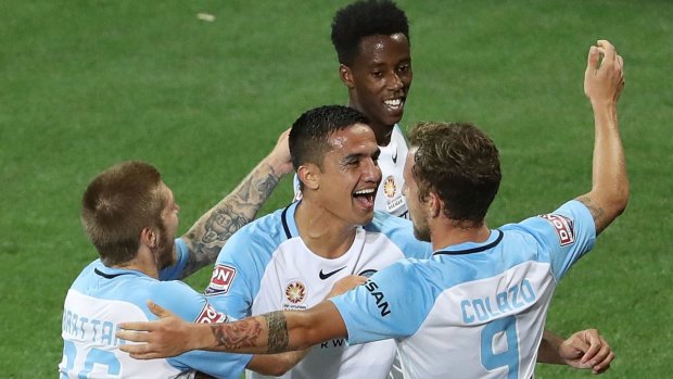 Marquee moment: Tim Cahill celebrates heading City in front at AAMI Park.